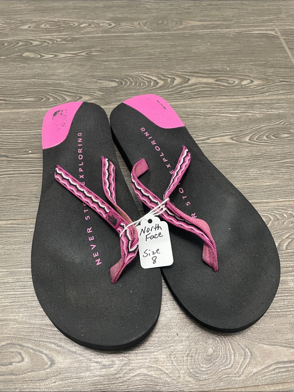 The North Face Women's Black and Pink Strap Flip Flop Sandals